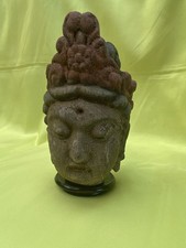 wooden buddha head statue