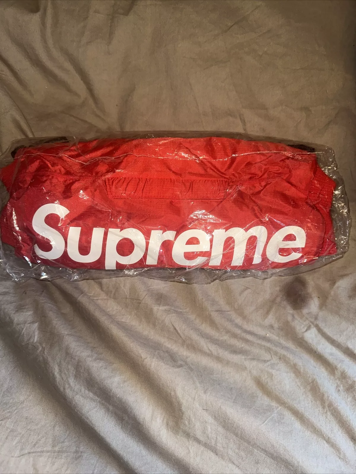 Supreme rouge cordura chauffe mains
