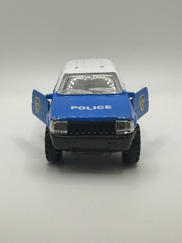 Unbranded Diecast Jeep Cherokee Police Blue/White 1:32ish Scale Pull Back ‘n Go - Picture 2 of 6