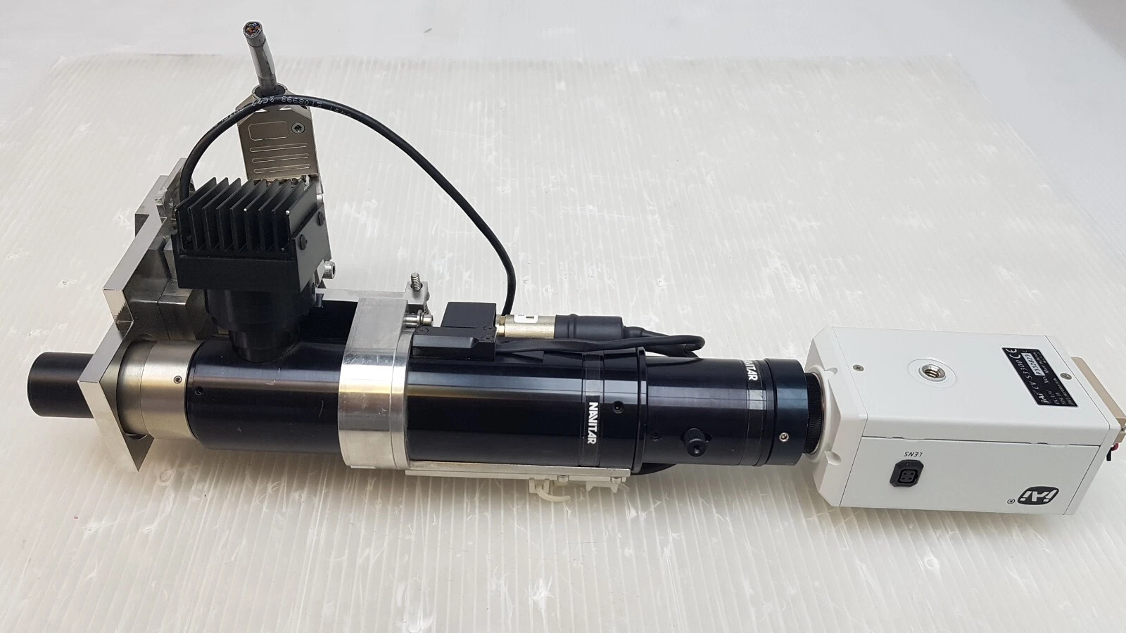 Navitar zoom lens with heat sink, bracket and JAI CV-S3300 color camera