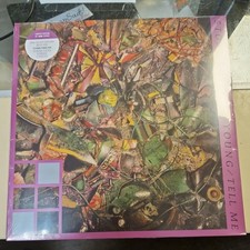 The Stone Roses "So Young/Tell Me" Ltd. Ed. Raspberry Vinyl Record 12" (Sealed) vinyl listing on eBay