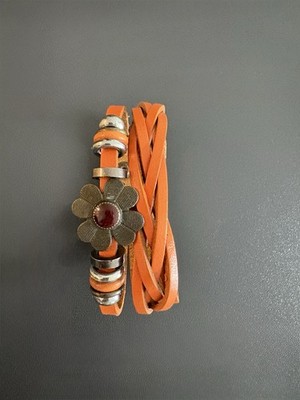 Leather finished handmade bracelet with flowers and rings decoration