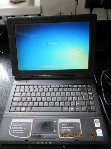 E-Systems 4213 laptop 13.3" screen, working and with charger. For spares/repairs