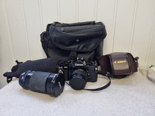 Canon A-1 35mm SLR Film Camera. Black , W/ 50mm 1.4 Les , Vivitar 28-210mm & Bag