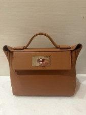 BNIB Store Fresh Hermes 24/24/21 Handbag. Gold Leather With Phw Hardware.