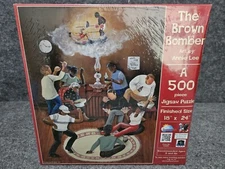 SunsOut 500 Piece Puzzle THE BROWN BOMBER by Annie Lee