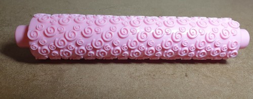 Plastic pink embossed rolling pin. Swirl pattern. 10.5" length. - Picture 6 of 6