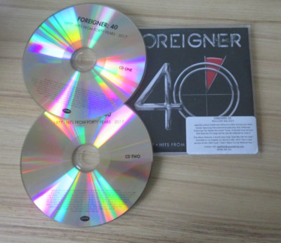 FOREIGNER 40, 2CD WERBEKOPIE IN HÜLLEN UND GATEFOLD GELDBÖRSE, 40 TRACKS