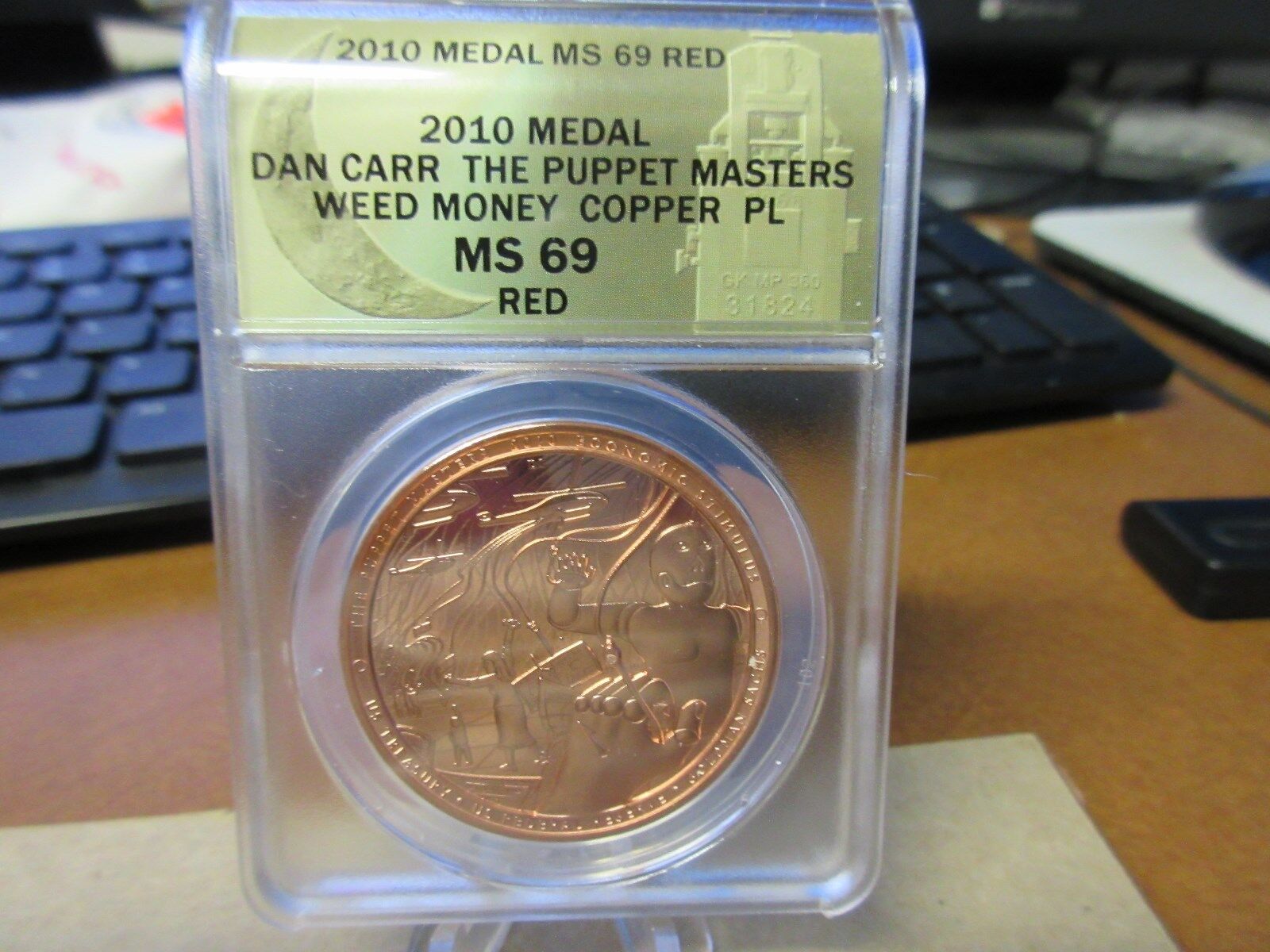 2010 Puppet Masters /  Weed Money HT Token by Daniel Carr  Coppe