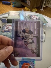 2025-26 Upper Deck Series 2 Holiday Edition Purple Dazzlers Connor McDavid #DZ98