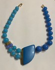 Rare Vintage Signed Crown Trifari Blue Lucite Asymmetrical Statement Necklace — photo 2