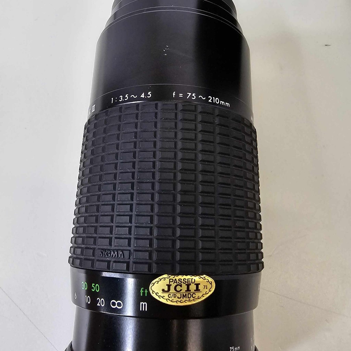 SIGMA Zoom K III 1:3.5-4.5 f = 75~210mm With Case Filter