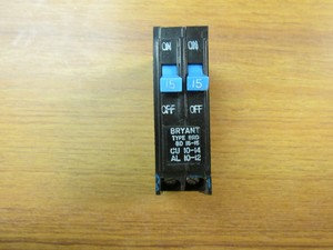 BRYANT CIRCUIT BREAKER 2 POLE, 15 AMP, CAT# BD1515 (CHIPPED)... F-247
