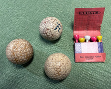 3 Vintage mesh and round dimple Kro Flite golf balls with matchbook tees
