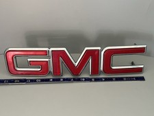 01-06 GMC Sierra Yukon Yukon XL Front Grill Emblem  Genuine OEM Red