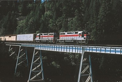 McCloud Rwy 36 & 37 EMD SD38s Crossing Lake Britton Bridge, CA Aug 2003 8,5 x 11