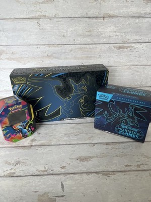 Phantasmal Flames Mega Charizard UPC, ETB und Tin Vitrinen (geöffnet)