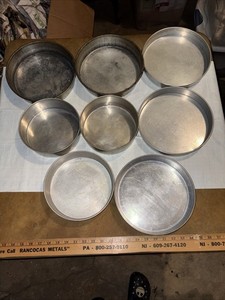 LARGE COLLECTION OF USED ROUND AUMINUM TIER TYPE CAKE PANS