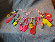 ksm. 1980's Charm Necklace Plastic Bell Clip 12 Charms 1 Extra Clip