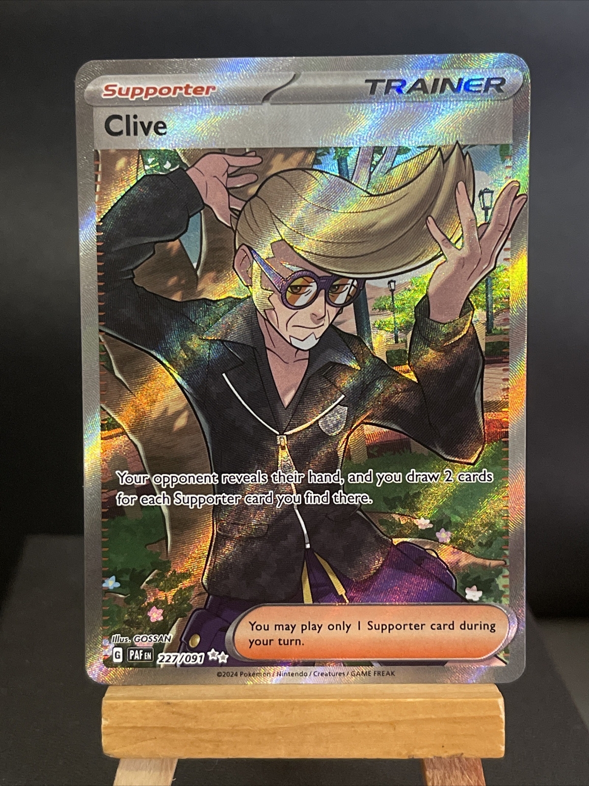 Pokemon Card Clive 227/091 Ultra Rare Trainer Paldean Fates Near Mint