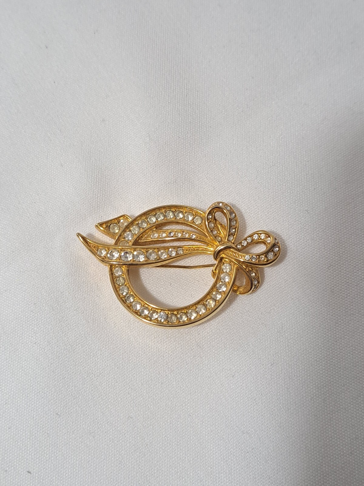 Vintage Nolan Miller Gold Tone Ribbon Bow Circle Crystal Heirloom Pin Brooch