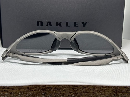 Oakley Penny x Metal Titanium Silver Black Iridium Polarised Sunglasses - Picture 3 of 5