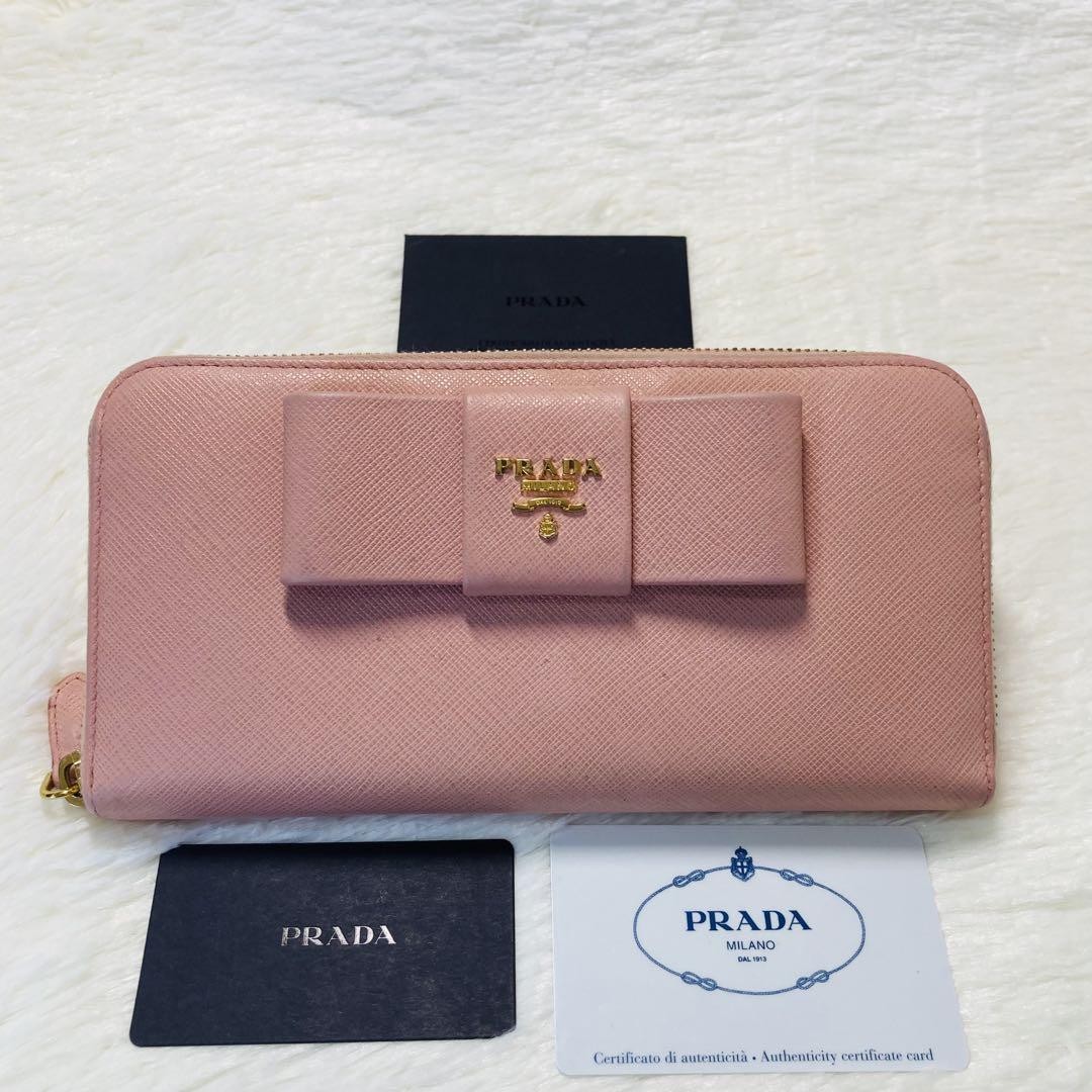 Prada Pink Beige Leather Wallet with Zipper and Round Ribbon in Good Condition