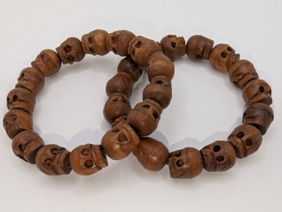 2 Skull Bead Bracelets. Carved Natural Wooden Skulls On Stretchy Cord Bracelet.