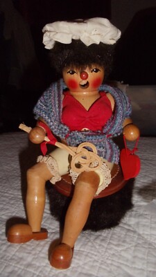 Steinbach Nutcracker  woman holding rug beater     * Liebling     9 1/2'' sitting