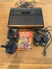 Atari 2600 Console with Joysticks and Paddles...