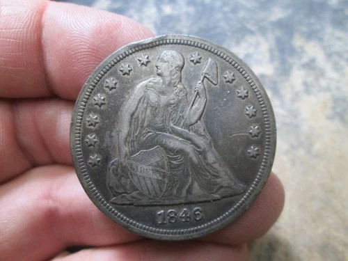 1846 US SEATED LIBERTY SILVER DOLLAR IN EXTRA FINE CONDITION RIM BUMPED