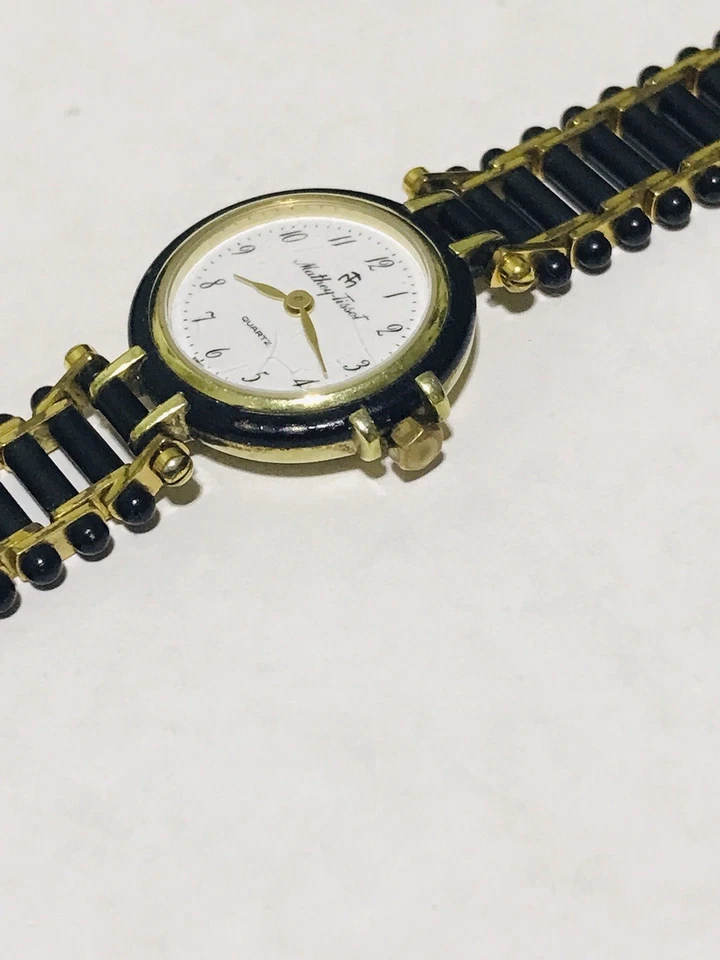 Reloj para mujer MATHEY TISSOT único dorado y negro de cuarzo hecho en Suiza 24 mm funciona Foto 3 de 4