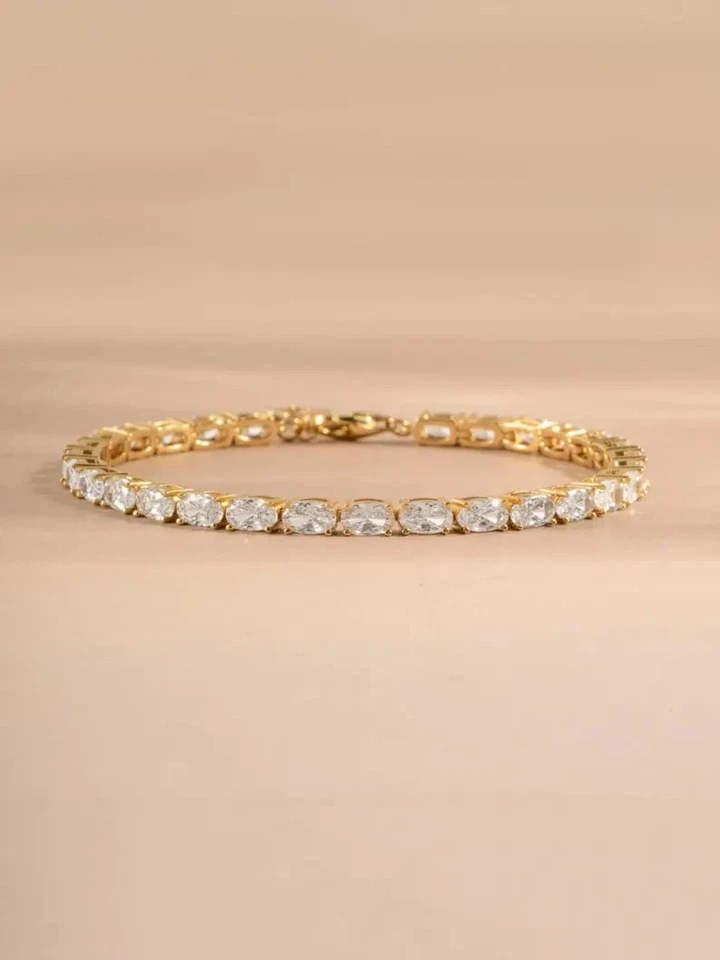 Brazalete de tenis de diamantes de corte ovalado cultivado en laboratorio de 8,50 quilates enchapado en oro amarillo de 14 k de 7,5" Foto 2 de 4