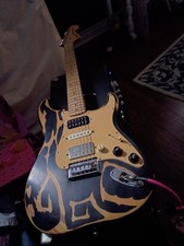 left handed conversion, drop C, 00's squire Big Hair strat guitar. Hard Tail