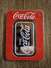 Coca-Cola 1 oz Silver Struck Bar in packaging
