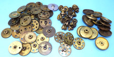 A collection of early Meccano brass gears, contrates, bush wheels, etc.