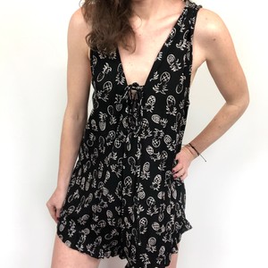 white sleeveless romper