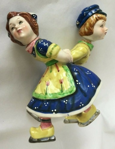 VINTAGE DUTCH GIRL & BOY ICE SKATING CRUET SET HEAD OMES OFF TO POUR 8" TALL