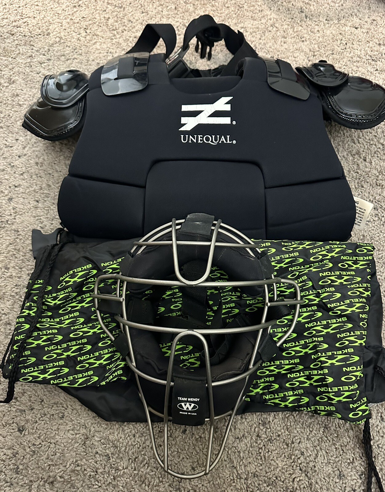 UNEQUAL chest protector. Titanium umpire mask with TEAM WENDY pads.USED