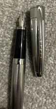 Vintage fountain pen from the Cross Apogee collection with a golden feather