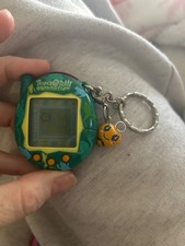 2004 Ver. 3 Dark Green with Frogs Tamagotchi Connection with character dangle