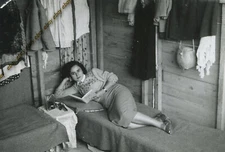 #35791 Greece 1950s. Girl reads in her bed. Photo