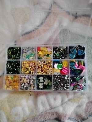 Container Full Of Nail Charms Decorations