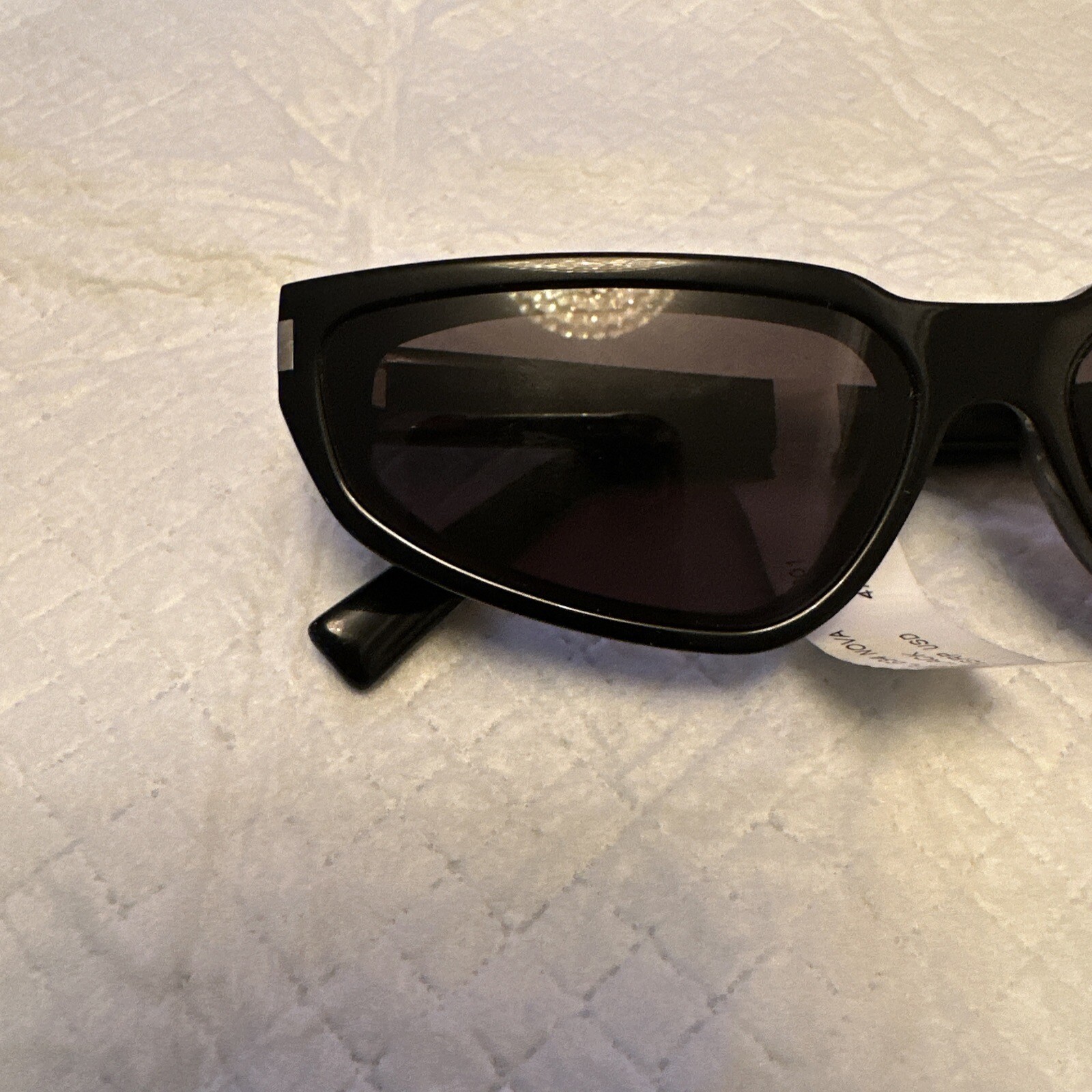 Occhiali da sole Saint Laurent Cat Eye SL 634 NOVA 001 montatura nera lenti nere