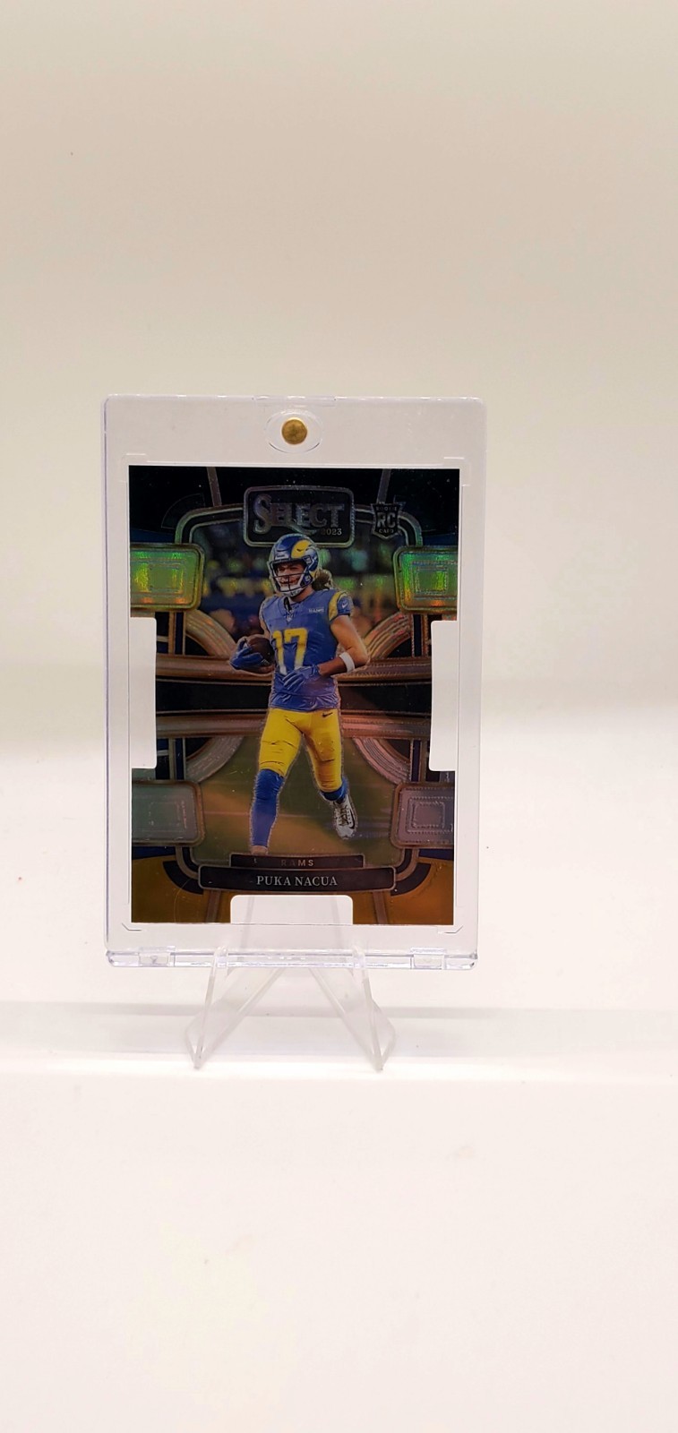 2023 Panini Select - Concourse Puka Nacua #56 Black & Gold Prizm Die-Cut (RC)
