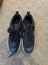 Kids Nike Black Sneakers With Gold Logo And While Soles, Flat Neck