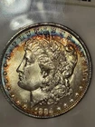 1884 O $1 Morgan Dollar NGC MS62 Toned