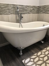 Freestanding Bathtub and Fixtures 