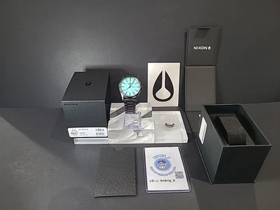 Reloj de cuarzo Nixon Sentry PERSONALIZADO negro cepillado/turquesa A105-2800.  - Imagen 1 de 4
