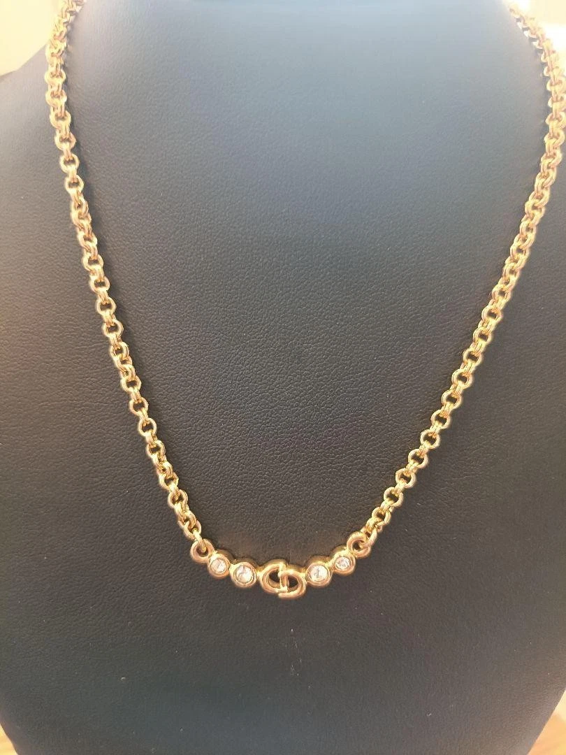 Collana Christian Dior con logo CD leggermente sporca con piccoli graffi